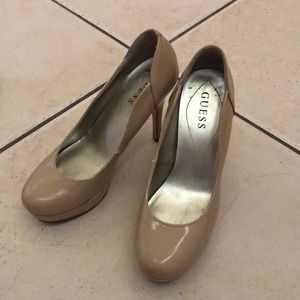 Guess tan pumps